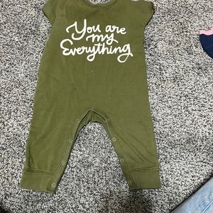 Green romper.